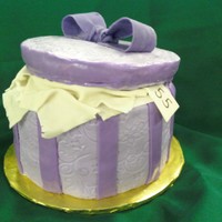 Purple Hat Box I made this birthday cake for a lady I work with who loves purple and wanted a hat box cake. 3 layers of vanilla cake with butterscotch...