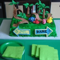 Jungle Junction Birthday Cake Hand molded characters out of fondant. The roads and trees are made of gum paste.