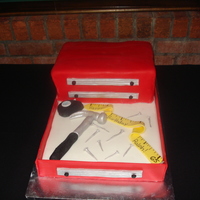 Tool Box Cake Chocolate cake with Chocolate Ganache covered in fondant. Tools all made by hand.