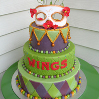 Mardi Gras Dummy dummy cake! This one gave me trouble because the fondant wasn't cooperating. I sure showed it who's boss.