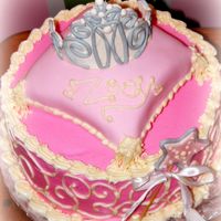 Princess Cake This is a cake that i made for a child's first birthday party. The tiara and wand are gumpaste. The pillow cake is covered in fondant...