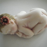Gumpaste Baby My first gumpaste baby. I was pleased with how she came out.