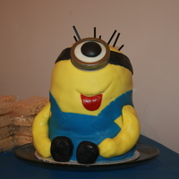 Despicable Me Minion Cake My very first attempt at more than just a "basic" cake...first stacked cake, first character cake, first time with fondant. I...