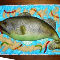 Bass Fish Cake Made this for a friend at work. Used the airbrush machine my handsome husband got me for Christmas, I love them both! ;-)