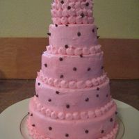 First Stacked 6", 5", 4", 3" and 2". The smaller cakes were difficult to ice (which is why the top is covered in dots). Just...