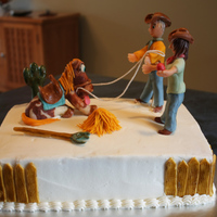 Country Life Gluten free white layered cake with chocolate filling and buttercream icing. Gluten free chocolate figurines.