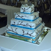 4 Tiered Sqare Wedding Cake Bride wanted to serve sheet cakes. So I baked one large square cake, cut the center out and filled with dummy styrofoam. Did same with the...