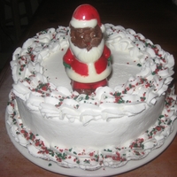 Santa 2011 Buttercream with Chocolate Santa and Sprinkle. The Santa face did not unmold well.