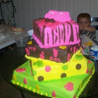 Baby Shower Cake baby shower cake I made for a coworker. They wanted bright yellows,pink and green and brown