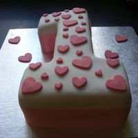 Number One Birthday Cake My first cake which i did for my daughters first birthday! White cake with almond bc and fondant.