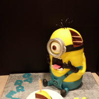 Minion Birthday Cake four 2 layer cakes make up the Minion. Special Thanks to MG Sugar Cakes for the design idea.