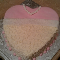 Heart Shape Bridal Cake Key lime flavored, cream cheese iced, heart shape cake. Decorated in wedding colors.