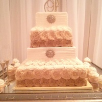 #teampoag Wedding Cake Shades of gold and ivory wedding cake. Lemon cake with lemon butter cream. Rosettes are piped with 1M tip.