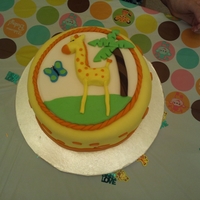 Giraffe Baby Shower Cake A baby shower cake done for a friend who was doing her baby's room in a jungle theme (mainly giraffes). Chocolate cake with raspberry...