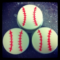 Oreo Baseballs White chocolate dipped oreos with stitching drawn on with edible marker...for a team of 5 yr olds who sound like they're saying "...