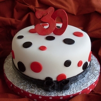 30Th Birthday Cake Red velvet cake brushed with coconut rum syrup and cream cheese filling brushed (crusting buttercream under fondant)