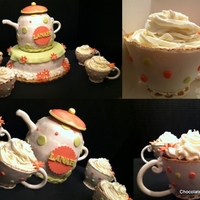 Tea Party Themed Cake Cups are made out of gumpaste and then the cupcakes are put inside. The teapot is a combo of a 6 inch round and the ball pan.
