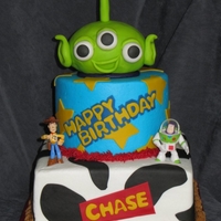 Toy Story Birthday BC with fondant accents, RKT Alien covered in fondant, fondant cow spots and lettering