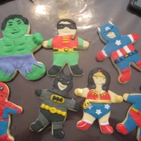 Superhero Cookies Sugar cookies decorated with a fondant/candy clay mix.