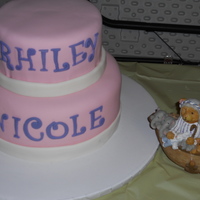 Baby Shower Chocolate covered strawberry cake covered in fondant. Wish I could say that I made the figurine, too, but it was a topper.