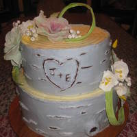 A Rustic Wedding Cake Made To Look Like Birch Bark All Buttercream Except The Flowers And Leaves Are Gumpaste A Rustic wedding cake made to look like Birch bark. All buttercream except the flowers and leaves are gumpaste.