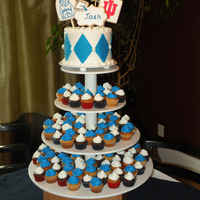 Vanilla Cake Vanilla And Chocoate Cupcakes With Buttercream Topper Is Sugar Cookies Decorated With Royal Icing Vanilla cake, vanilla and chocoate cupcakes with buttercream. Topper is sugar cookies decorated with royal icing.