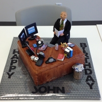 Birthday Cake For Boss Fondant covered cake. All other elements made from gumpaste, logo's etc. printed on fondant paper. Doll also handmade.