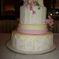 Summer Wedding Cake I made this for a contest - the theme was summer. It's real cake covered in fondant with gumpaste flowers and decorations.