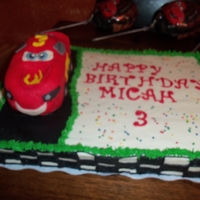 Lightening Mcqueen, Car Cake car covered with fondant.