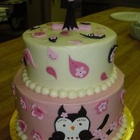 Owl First Birthday Cake Client sent me several photos with different aspects of each to incorporate. The two tiers were iced in cream cheese icing and the accents...