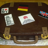Suitcase Cake Grooms travels for work and that is how he met his wife in japan. He wanted to incorporate this is his grooms cake. We choose 5 places he...