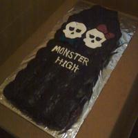 Monster High Cofin Choco cupcake order with white fluffy icing (store bought) turned black with black food gel. The skulls/bows are made with MMF and painted...