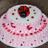Baby Ladybug I made this for a baby shower. Buttercream with fondant letters and ladybug.