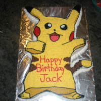 Pikachu My husband drew this on cardboard and then I cut it from a large sheet cake. Decorated free hand. For a 7th birthday party.
