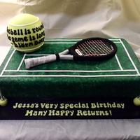 Tennis Theme Tennis court cake with tennis ball, 2:1 scale replica of customer's racquet, mini tennis ball candle holders.