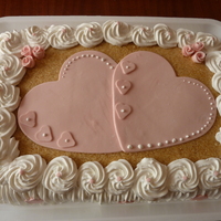 10 Years Wedding Anniversary Vanilla and caramel filling, whipped cream frosting and marshmallow fondant hearts.