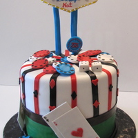 Vegas Birthday! Vegas inspired cake for my friends birthday. Marble cake with fudge filling, gum paste cards, pokerchips, dice.