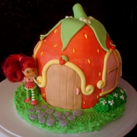 Strawberry Shortcake House WASC with buttercream and MMF decorations. I used a cupcake pan to get the shape. So much fun to do. Thanks to cc4u for the inspiration!