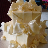 Wedding Shower Cake-Chocolate Wrap Modeling chocolate gift wrapped technique (Richard Festen). 8 & 12 inch square, chocolate cake/filling. All exterior parts are made of...