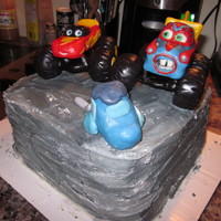 Monster Truck Mater & Lightening Mcqueen This is the cake I made for my Daughters 5th Birthday. She wanted a certain scene from The "Cars Toons" dvd, "Mater's...