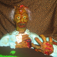 Sam The Zombie I made this cake for my kids halloween party at school...the kids cried and would not eat him