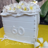 Frangipanis In A Box!!! 3X 9inch cherry ripe mud cakes filled/stacked/ganached/fondant/gumpaste frangipanis and accessories.inspired by cakes4funshop.co.uk