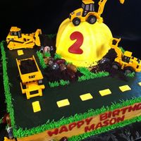 Construction Cake My friend found a similar cake online and gave the photo to me to recreate so I'm not sure who to give credit to. Done in buttercream...