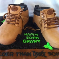Work Boots Chocolate cake done in MMF. (Inside joke on the message in front of the cake :) I drew out a template from the side of a real boot and used...