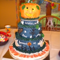 1St Birthday Halloween Cake My grandson's first birthday and it is on Halloween. Yellow, White and Chocolate, IMBC with cand clay figurines.