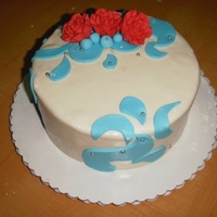 Aqua, Red And White Cake Chocolate cake, BC filling, MMF. Premade RI roses.