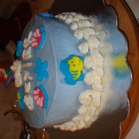 The Little Mermaid I made this cake for my little girl who turned 5. She just loves the little ariel. This cake is a vanilla cake with meringue buttercream.