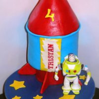 Rocket Buzz Rocket made from cake and fondant, Buzz handmade with Gumpaste.