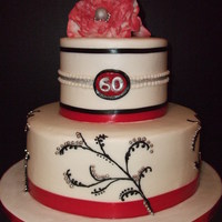 60Th Birthday Buttercream frosting, gumpaste fantasy flower, real ribbon, buttercream vines with silver dragees.