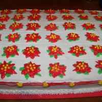 Poinsettia Sheet Cake This is a white sheet cake. The flowers are done in buttercream
